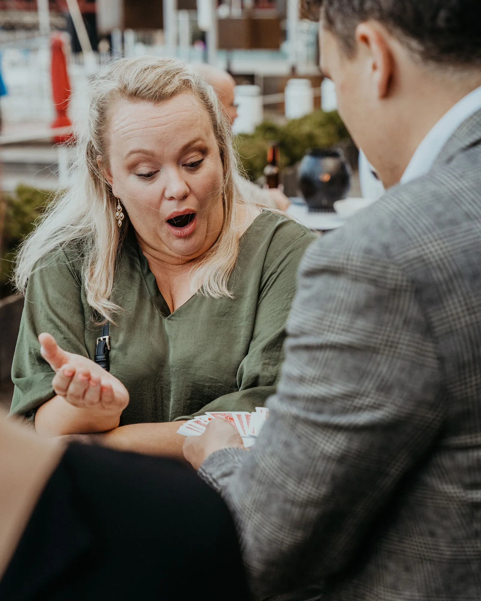 A guest reacting to Andy Nunn's close-up roving mentalism